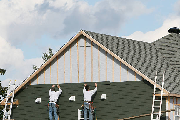 Professional Siding Contractor technician working in Medford, MN